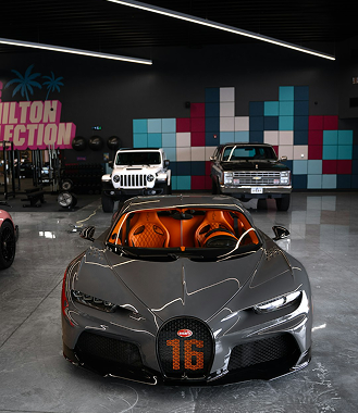 Private Sales - Grey sports car with orange interior